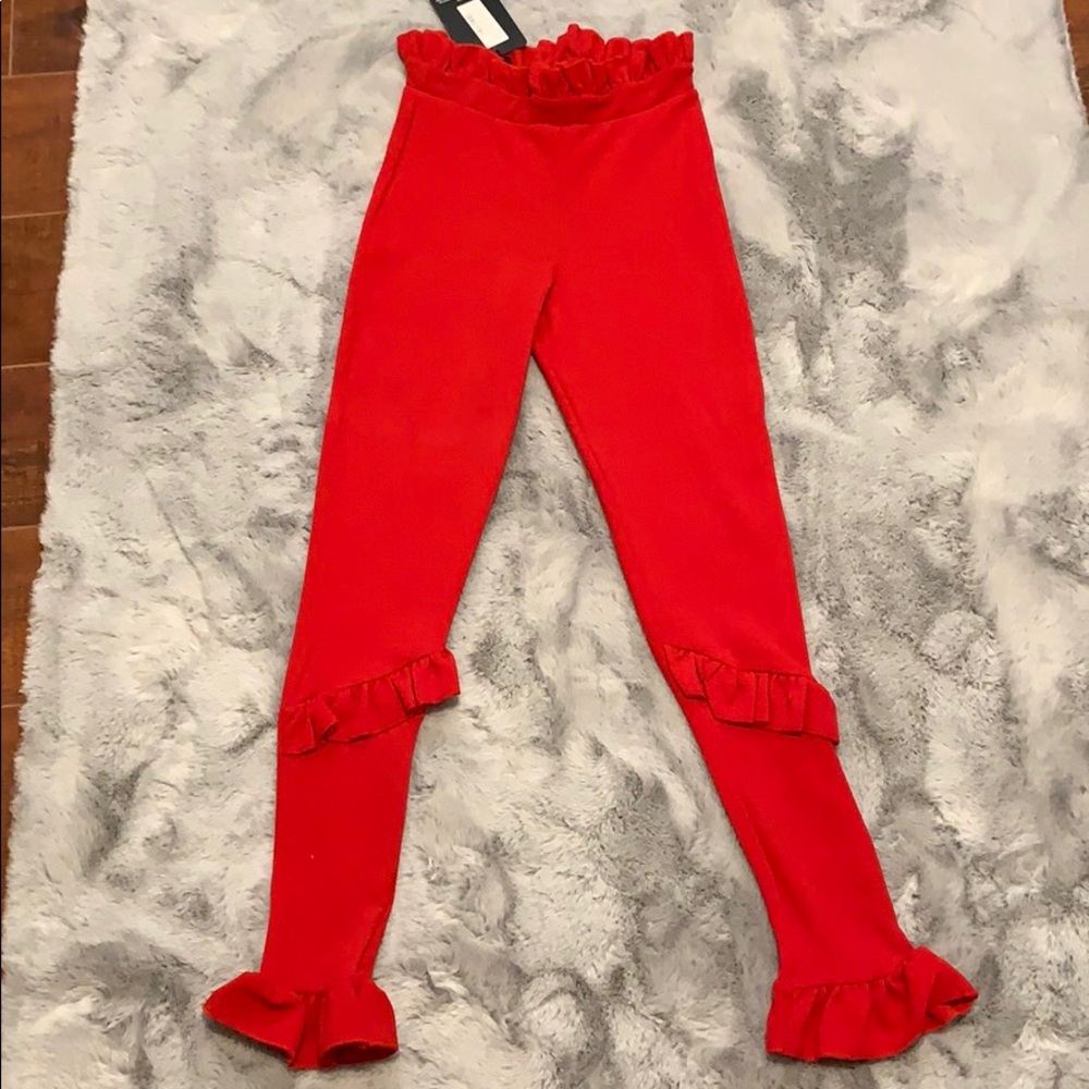 Red high waisted trousers